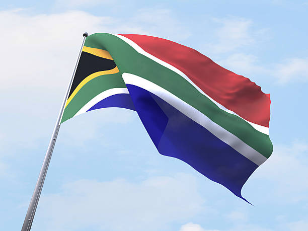 istock South Africa flag flying on clear sky. 486966226