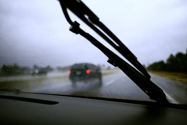 istock Traveling Automobiles in the Rain 486966708