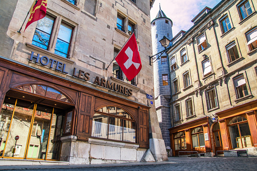 Geneva, Switzerland - April 10, 2015: Hotel Les Armures in Geneva Old Town and medieval buildings 