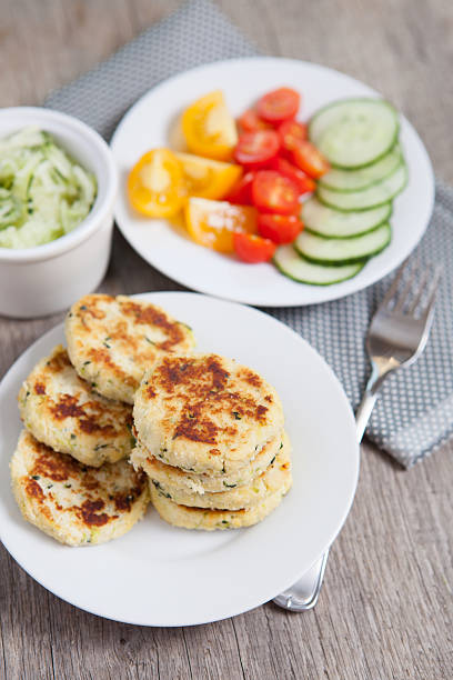 istock Vegetarian breakfast:  zucchini fritters and a salad 486969550