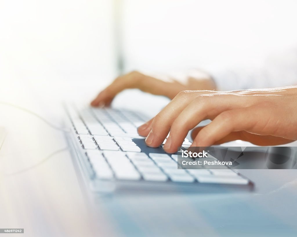 busienssman hands pushing keys busienssman hands pushing keys of keyboard, close up 2015 Stock Photo