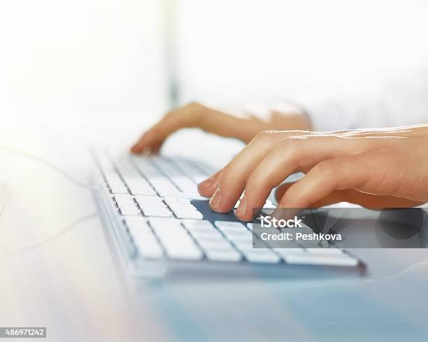 Busienssman Hands Pushing Keys Stock Photo - Download Image Now - 2015, Business, Business Finance and Industry