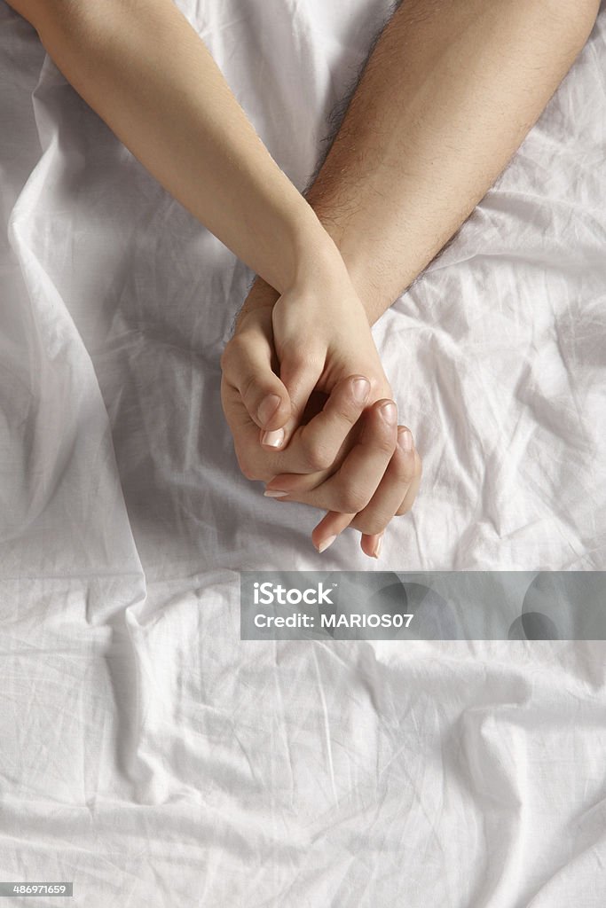 lovers A couple holding hands Couple - Relationship Stock Photo