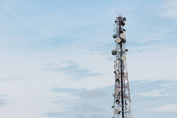 istock Satellite dish telecom tower on morning sky 486971668