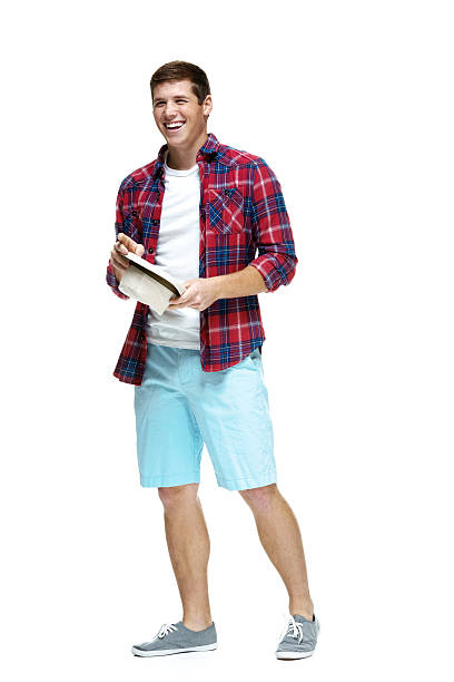 istock Happy young man standing with fedora 486971703