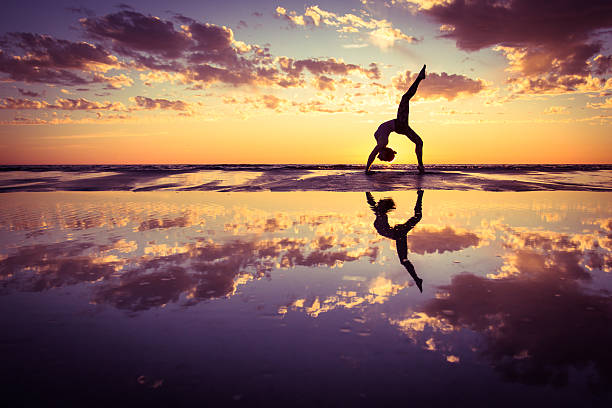woman practicing yoga
