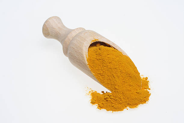 istock Turmeric, Curcuma longa powder 486973410
