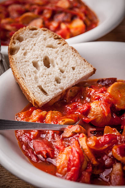 istock Lecho - stew with peppers, onions and sausages. 486973492