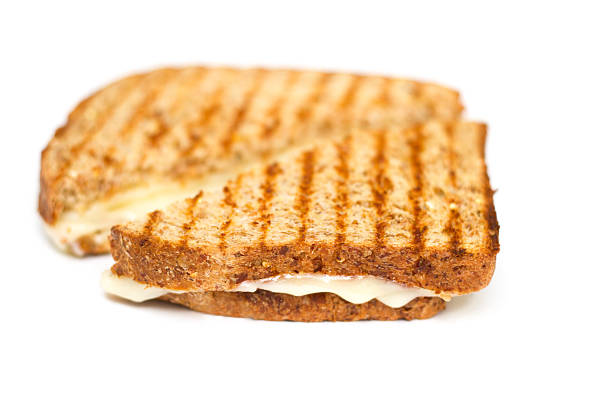 istock Grilled Cheese Sandwich, Whole Grain Bread, Grill Marks, White Background 486974738