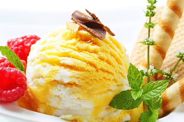 Ice cream dessert Scoop of ice cream with wafer sticks ice cream with wafer rolls stock pictures, royalty-free photos & images
