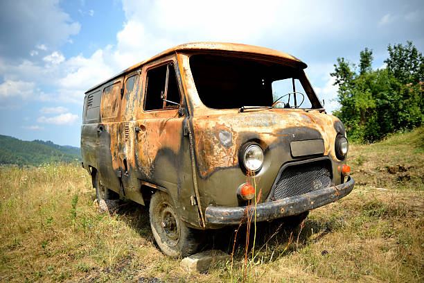 istock Old car in the field 486977890