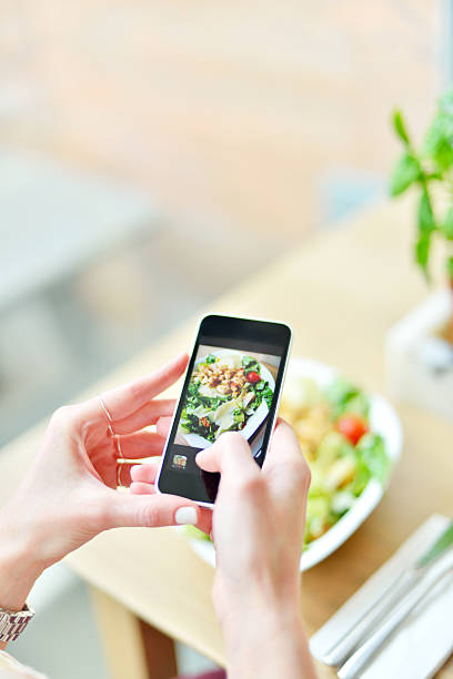 istock Smartphone taking picture from salad 486978037