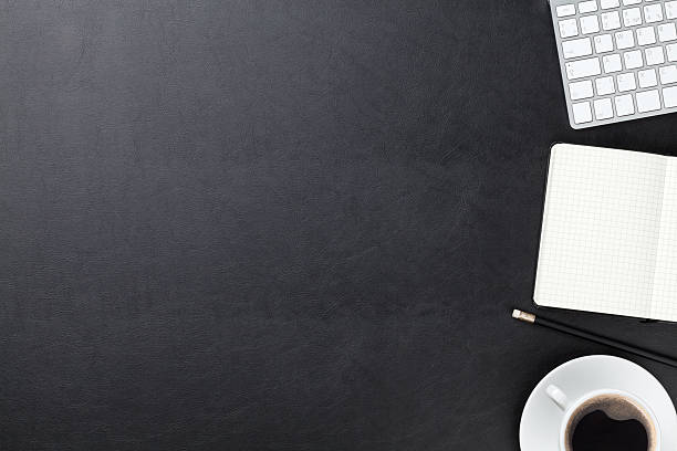 istock Desk with computer, supplies and coffee 486978188