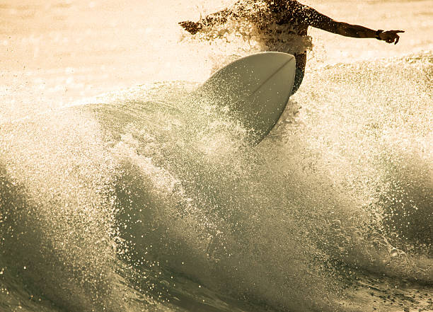 istock Unrecognizable person riding a wave at sea. 486981212