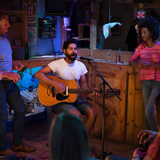 istock Singer/Songwriter Playing in Local Bar 486982062