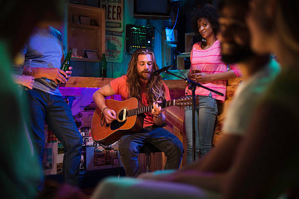 istock Singer/Songwriter Playing in Local Bar 486982064