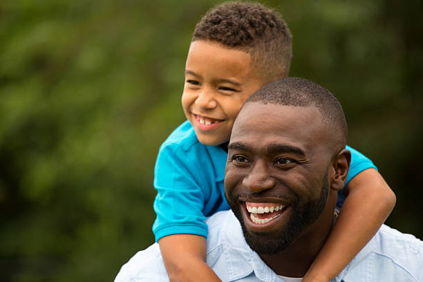 istock African American father and bi racial son 486984014