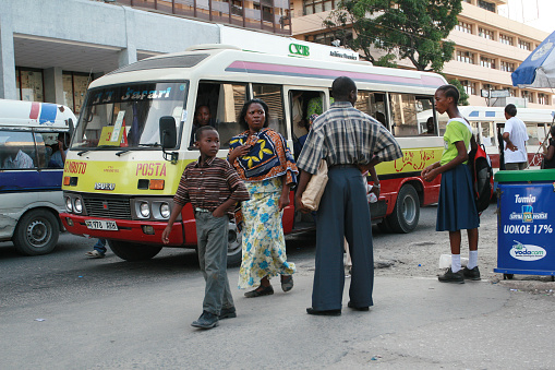 Dar es Salaam, Tanzania - February 21, 2008: Stopping the municipal public transport, crowded bus at rush hour.