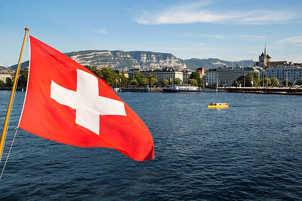 istock Geneva lake and Swiss flag 486988024