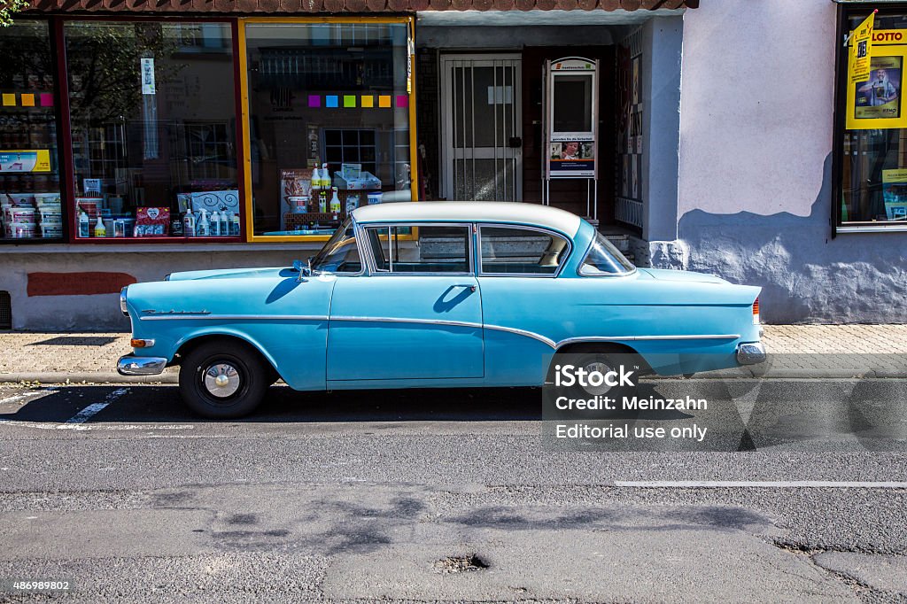 old Opel Rekord parks at a street in Schotten Schotten, Germany - August 30, 2015: old Opel Rekord parks at a street in Schotten, Germany. The car was first built in 1953 and sold more than 10 mio times. 1953 Stock Photo