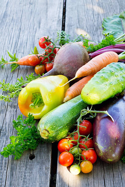 istock Vegetables on a wooden background 486992538
