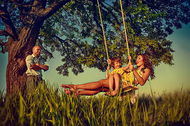 istock girl on the swing 486999593