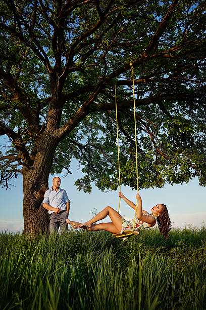 istock girl on the swing 486999671