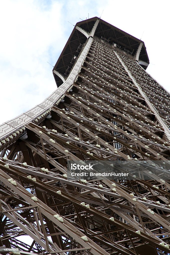 Curved Steel The Eiffel Tower in Paris. Architecture Stock Photo