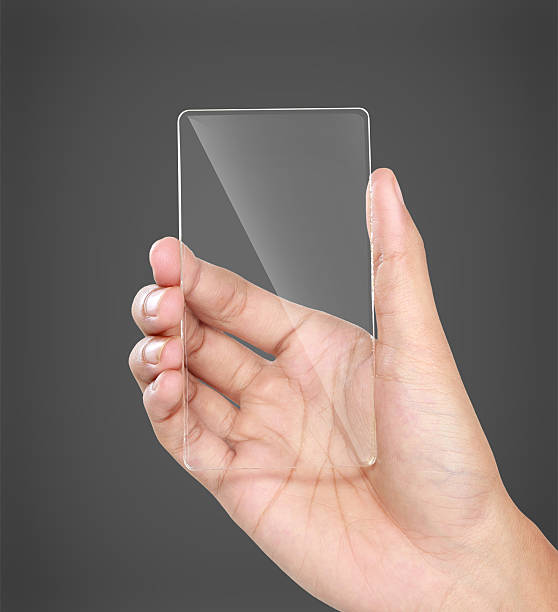 istock hands holding futuristic transparent mobile phone 487001377