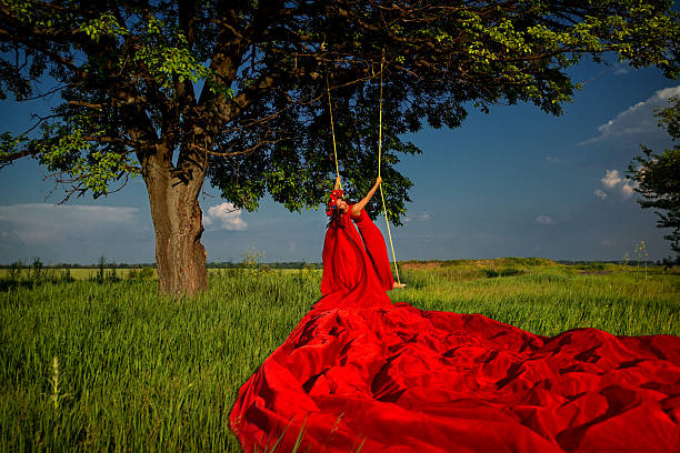 istock Woman in on the swing 487001505