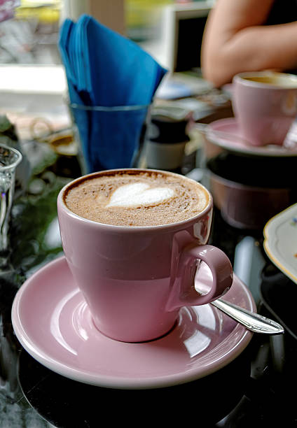 istock Pink cup of cappuccino 487002262
