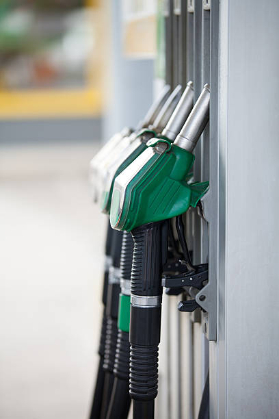 istock Pump nozzles at the gas station 487004698