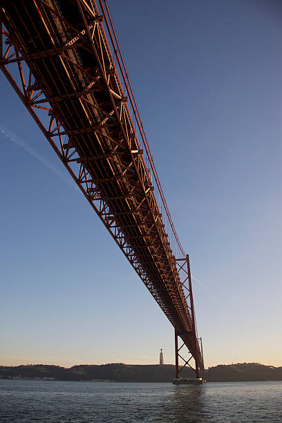 istock Suspension Bridge with sunset in Lisbon 487004922