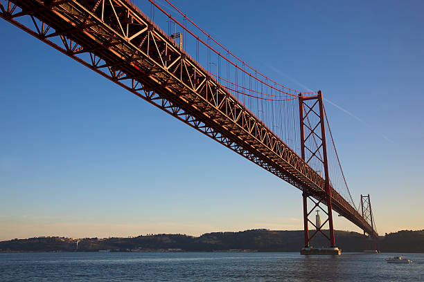 istock Suspension Bridge with sunset in Lisbon 487004934