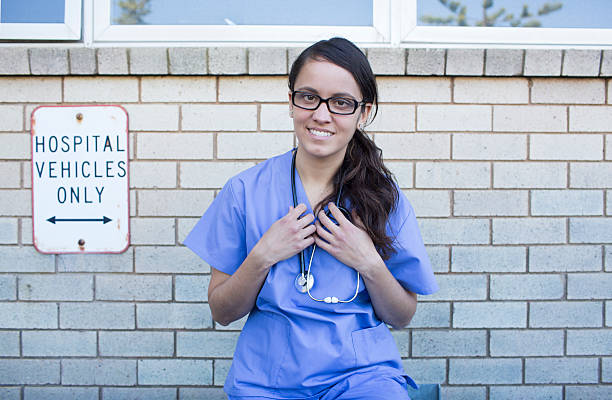 Australian nurse standing outside a hospital