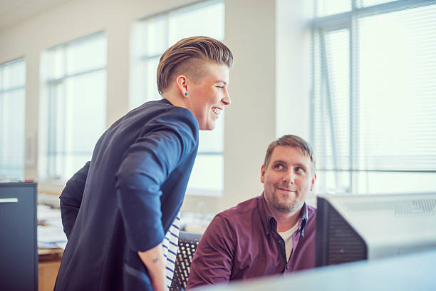 istock Happy business people working together in office 487007896