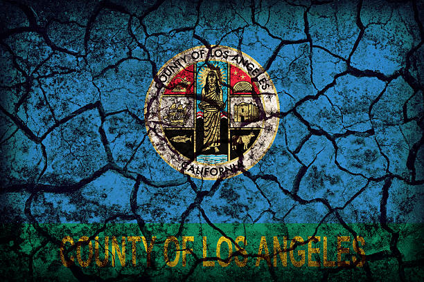 istock Los Angeles County , California flag pattern on crack soil textu 487008318