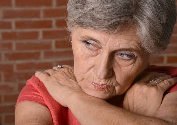 istock Senior sad woman 487012258