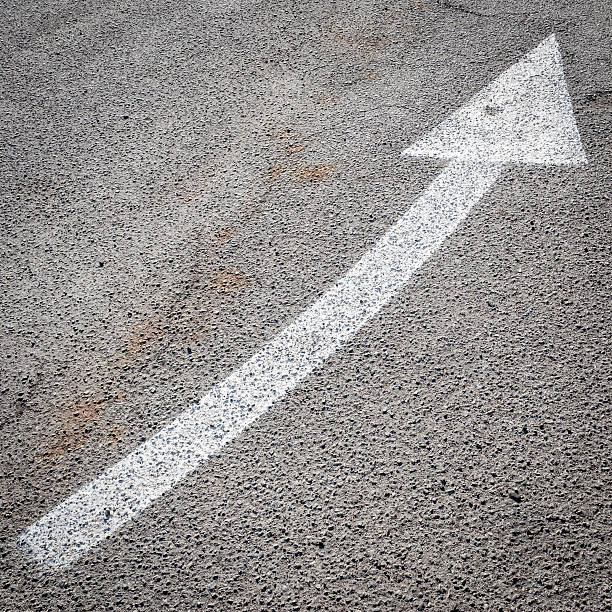 istock Arrow symbol on concrete. Top view 487016081
