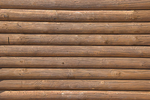 istock Wall made of wooden logs 487016939