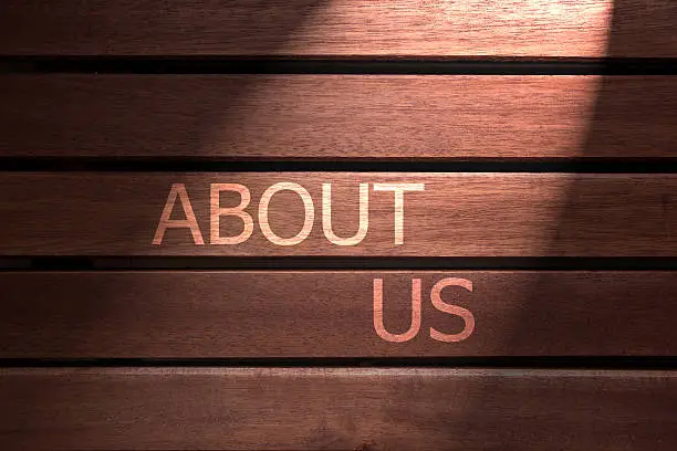 about us text on wooden