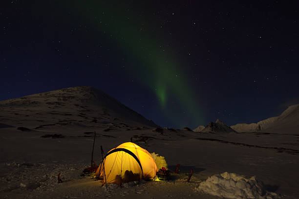 istock Northern lights over a tent 487018649