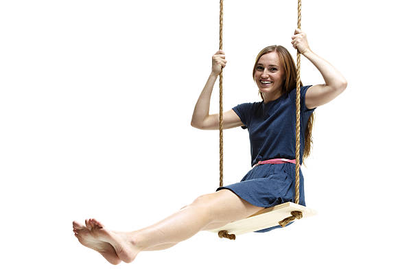 istock Cheerful female swinging 487021250