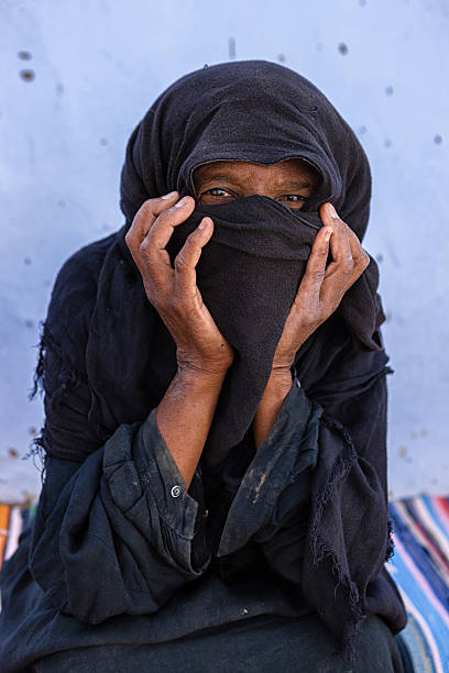 istock Old Muslim woman in Southern Egypt 487021892