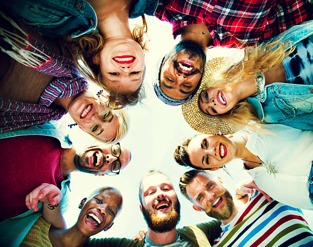istock Friends Huddle Join Holiday Party Group Concept 487022414
