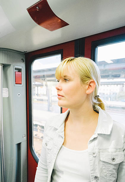 istock Beautiful Woman On Subway Train 487022544