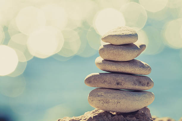 istock Stones balance at the beach, stack over blue sea 487028542