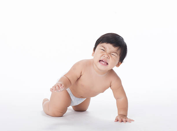 istock crying baby girl on white background  isolated 487028622