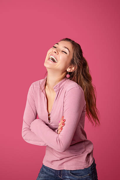 istock Beautiful young woman laughing 487039876