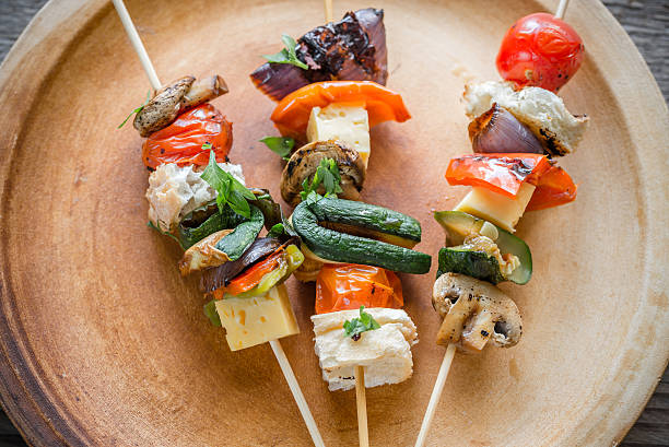 istock Grilled vegetable skewers on the plate 487041550